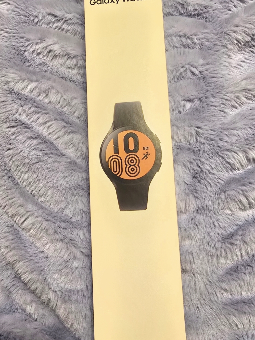 Samsung Galaxy Watch 4 with Black Band and A Vivid 44mm Watch Face